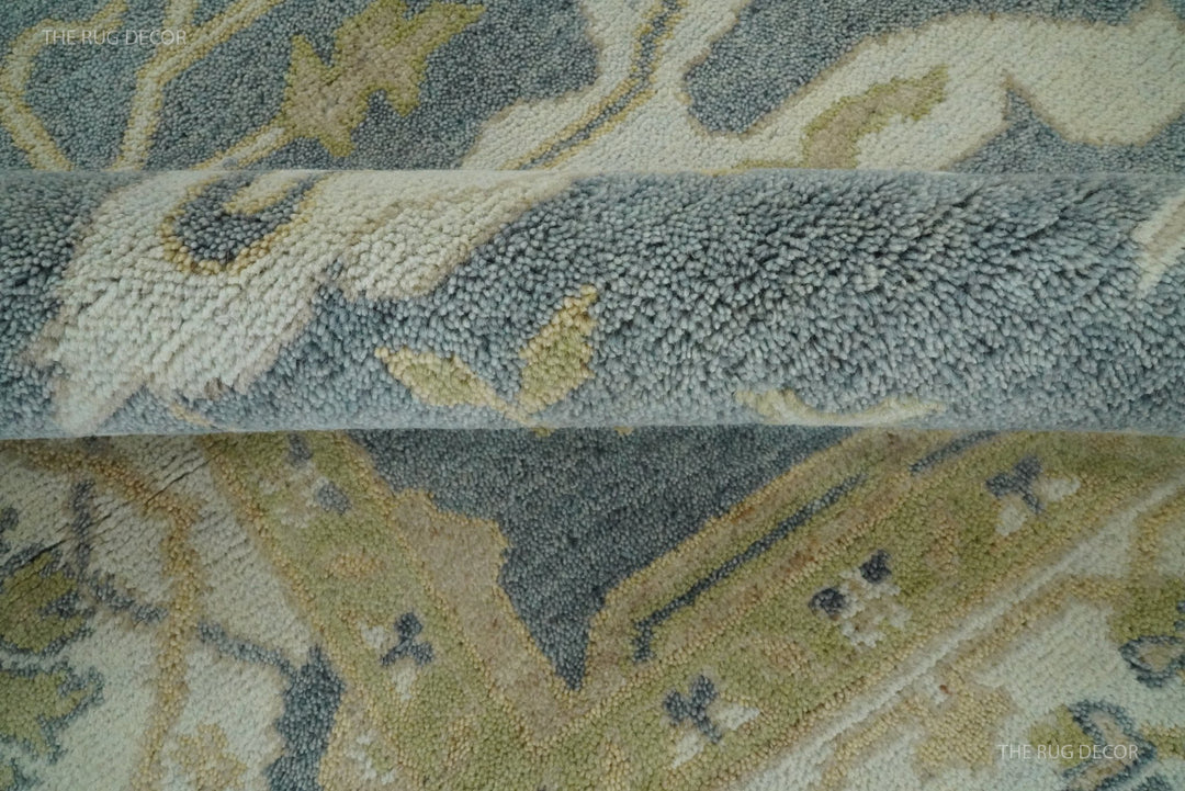 Close-up of the rug's thick pile and woven floral design