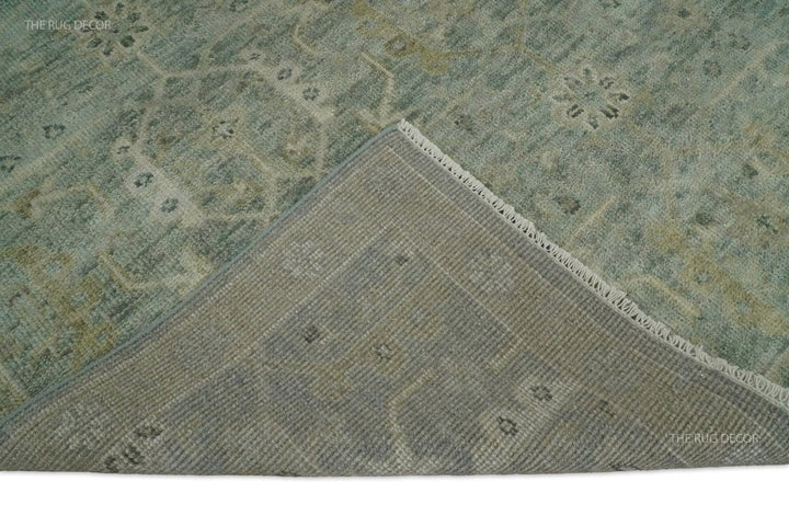 Folded rug corner showing its woven backing and fringed edge