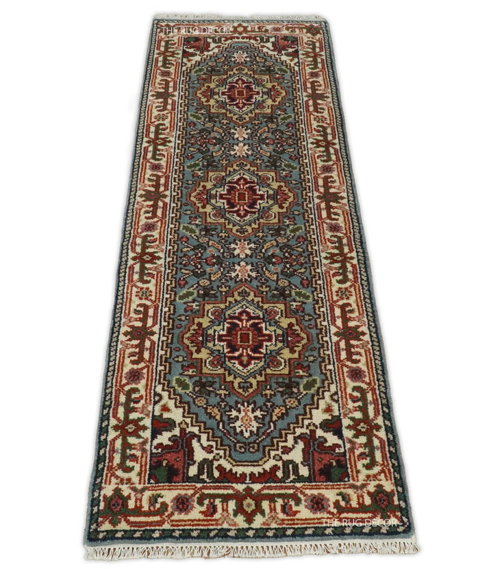 Traditional blue and ivory wool runner rug with three central medallions
