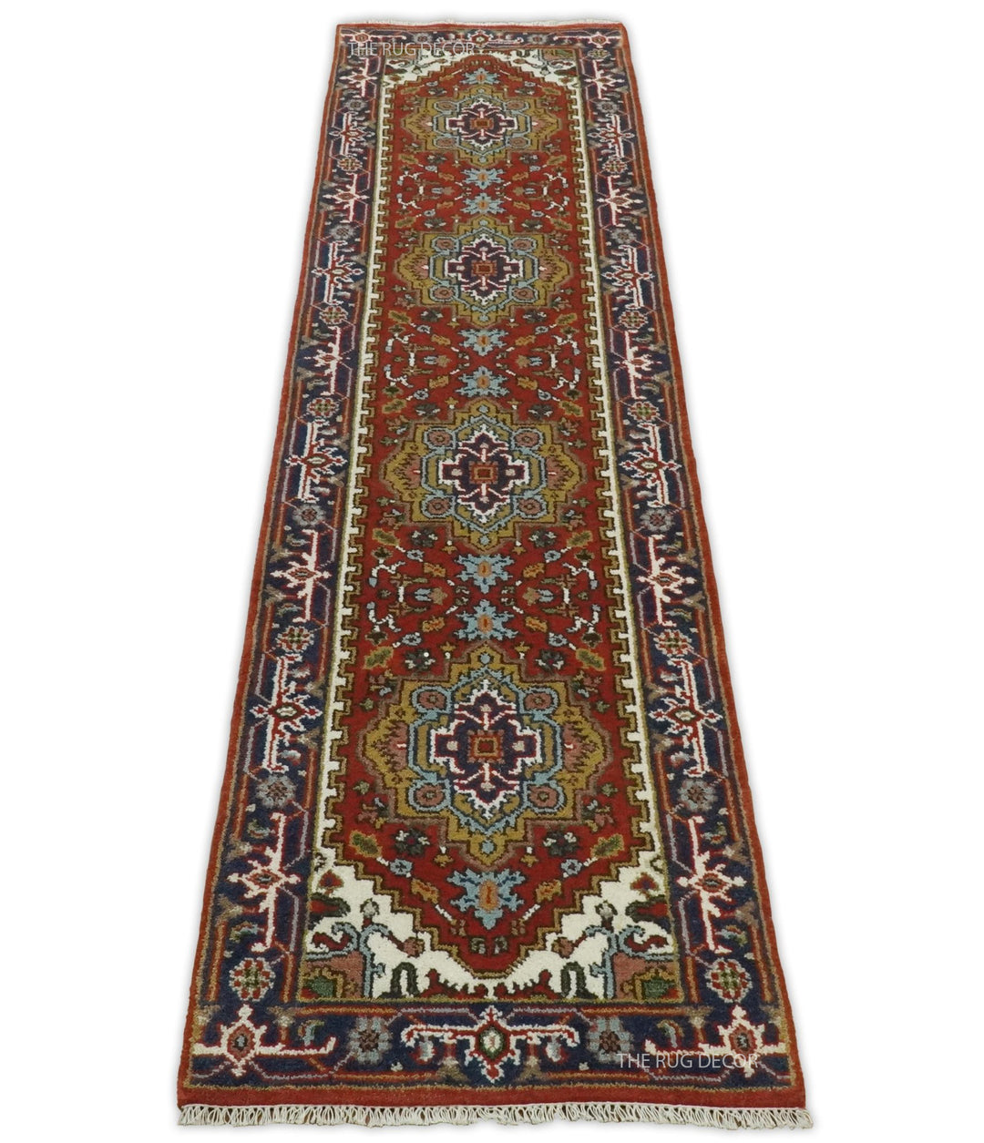 Full view of the traditional floral runner rug with rust center and dark blue borders