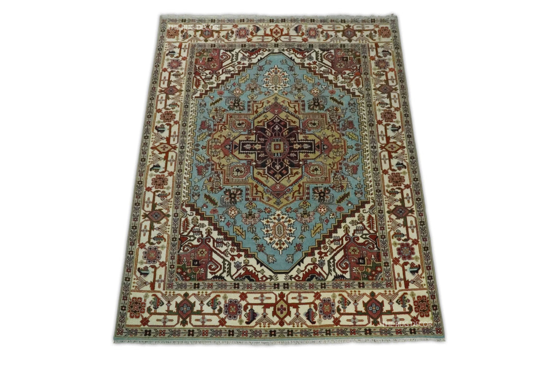Full traditional blue and ivory medallion rug with an ornate floral border
