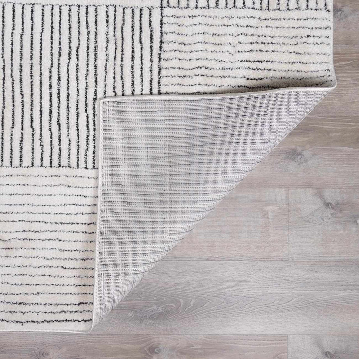 Basira Geometrical Ivory And Black Machine Woven Rug