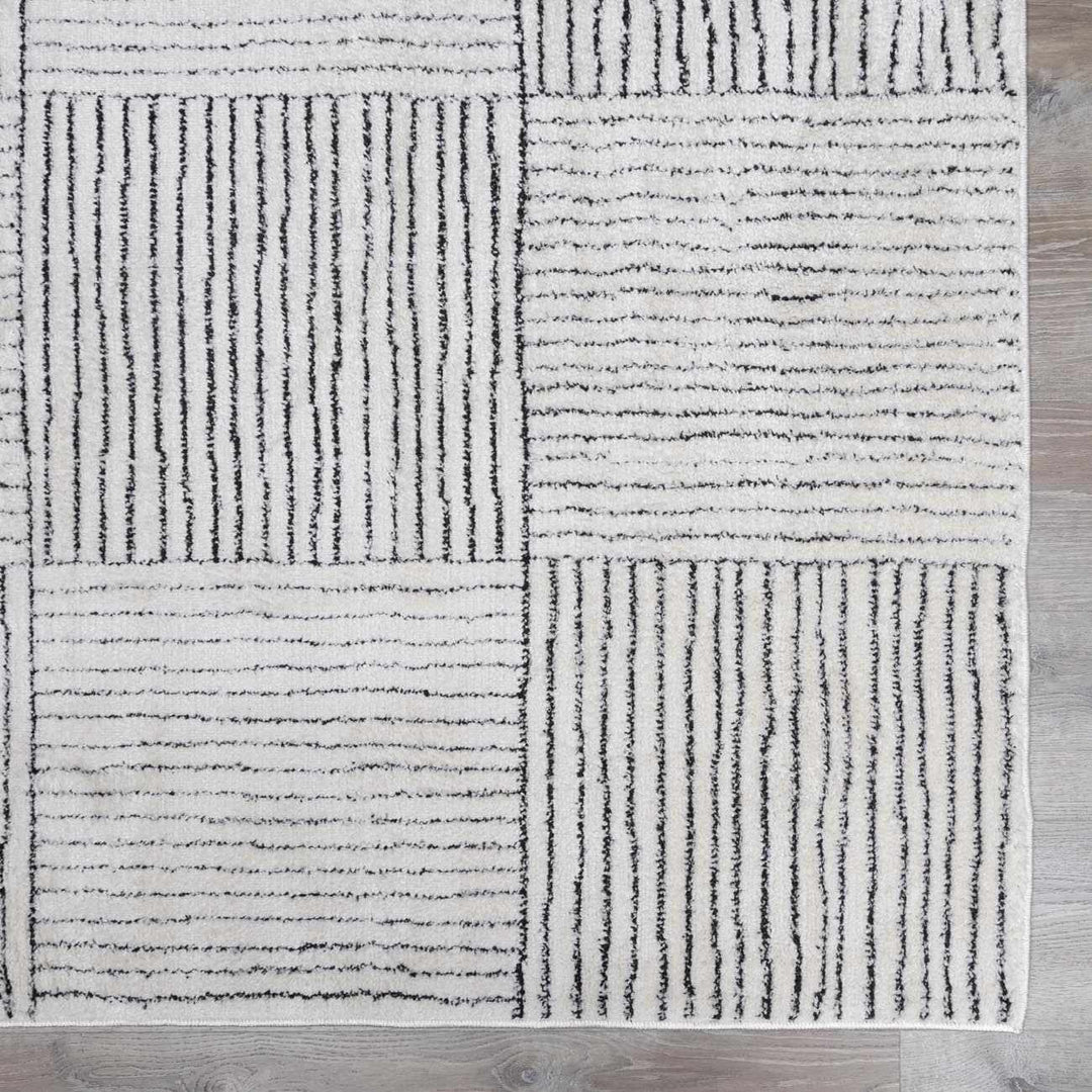 Basira Geometrical Ivory And Black Machine Woven Rug