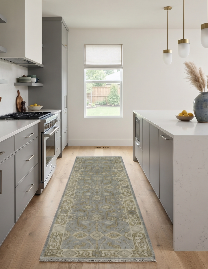Gray and beige patterned wool runner rug laid along a kitchen floor