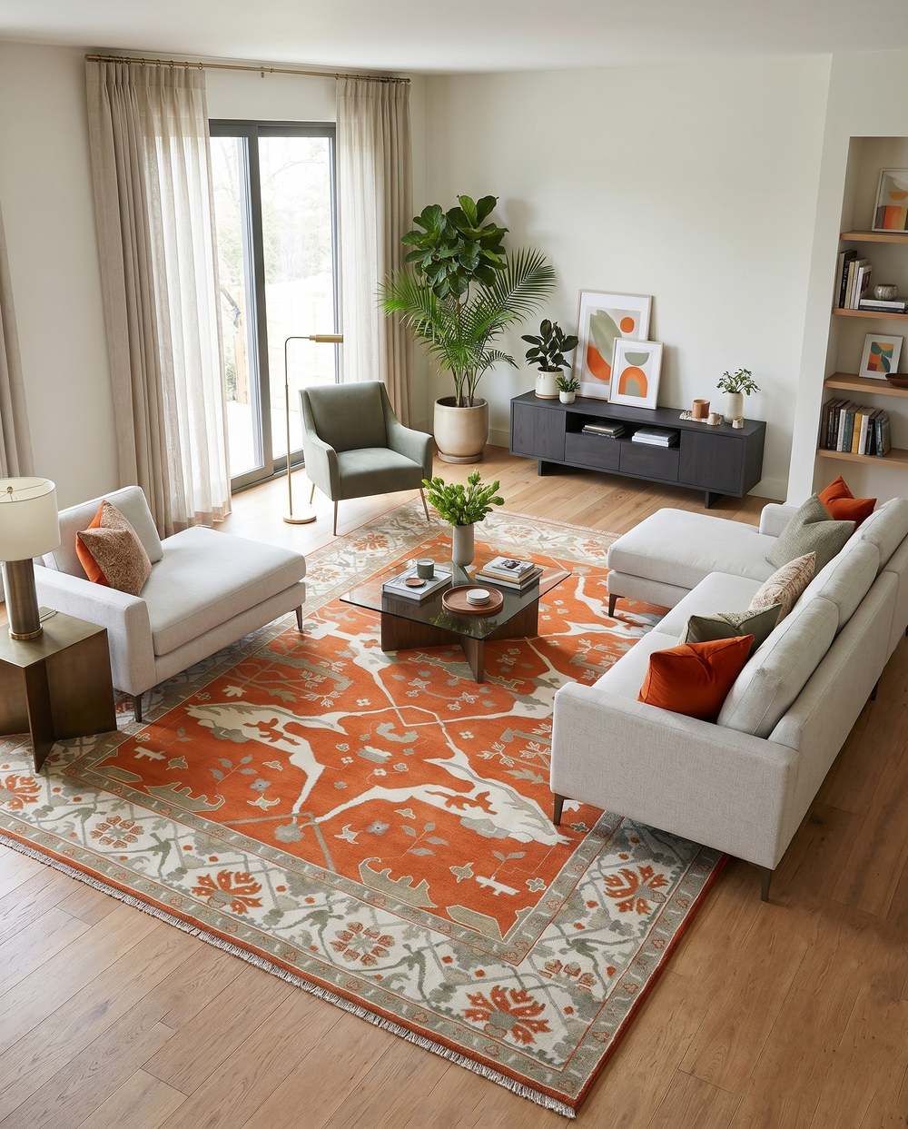 Wool Oushak area rug with an orange field and ivory, olive, and floral motifs