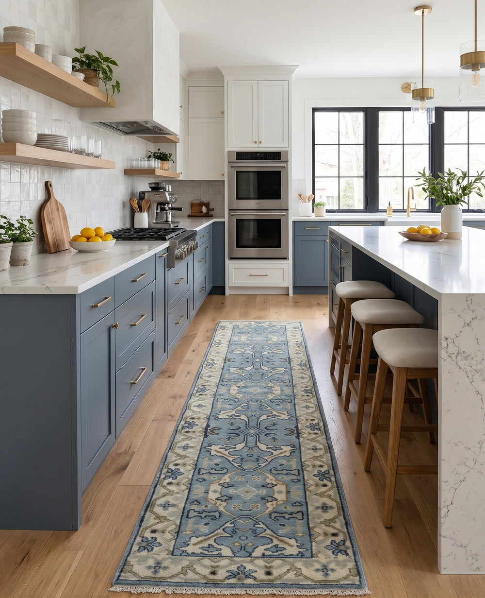 Blue-gray and beige floral runner rug laid along a kitchen floor
