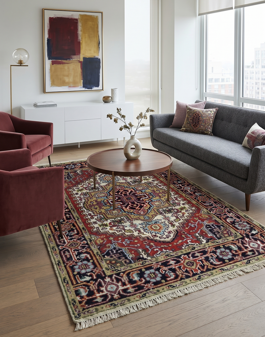 Hand-knotted wool Serapi rug with red and dark blue design under modern seating