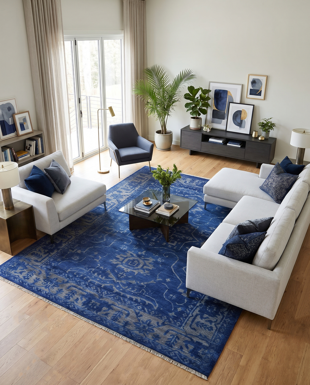 Blue and gray wool area rug with intricate traditional pattern and narrow border