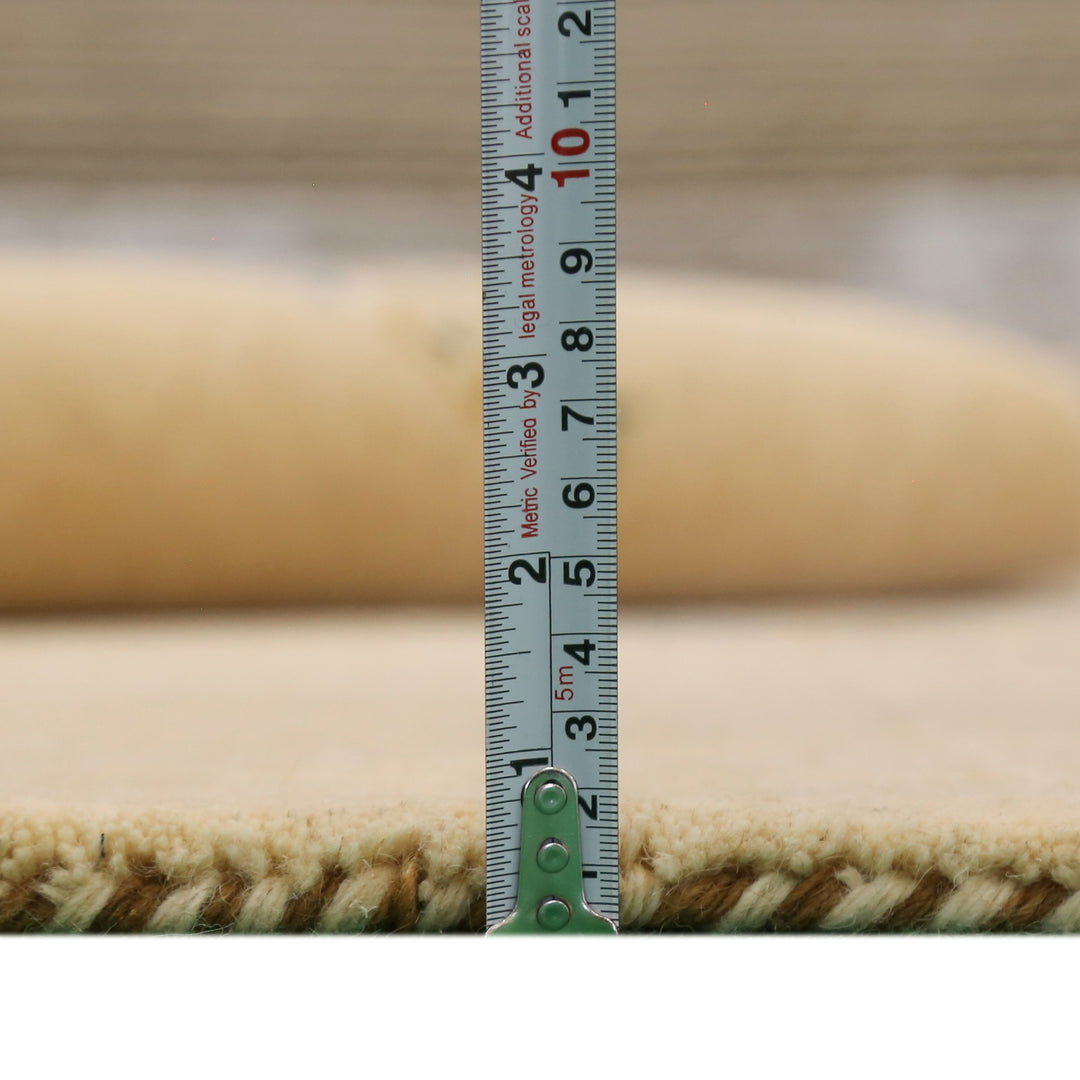 Ivory Border Patterns Hand Loomed Wool Area Rug