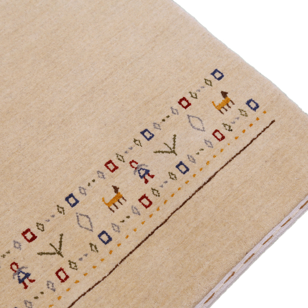 Tribal Border Ivory Design Hand Loomed Wool Area Rug