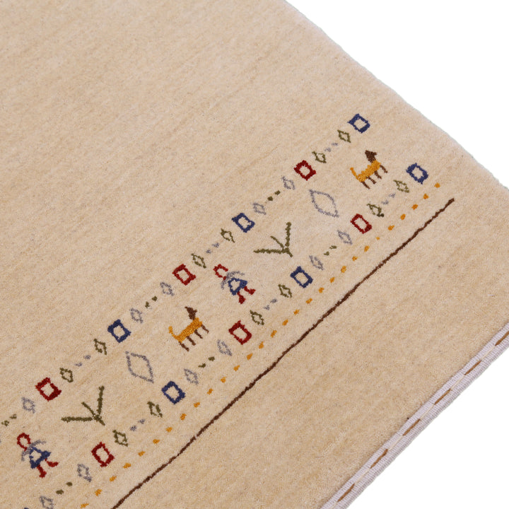 Tribal Border Ivory Design Hand Loomed Wool Area Rug