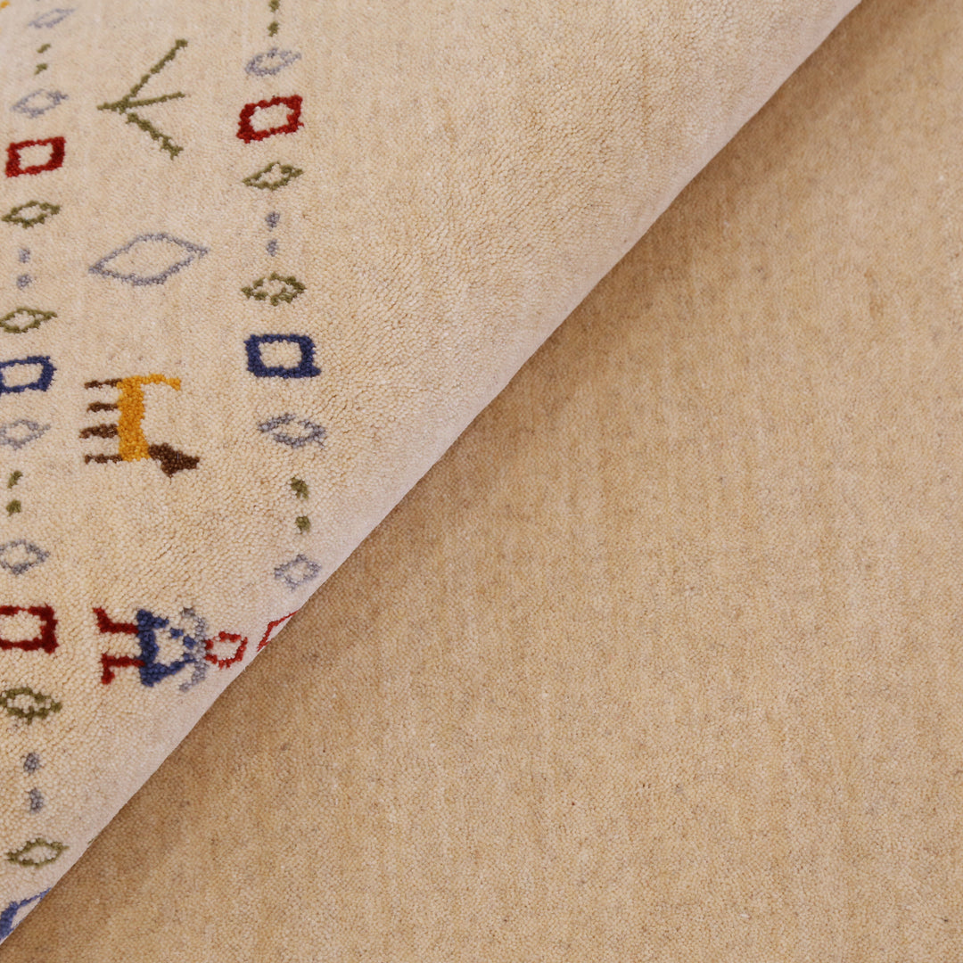 Tribal Border Ivory Design Hand Loomed Wool Area Rug