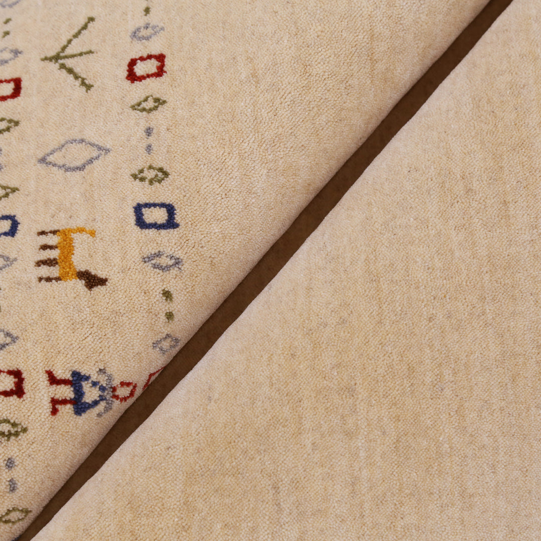 Tribal Border Ivory Design Hand Loomed Wool Area Rug