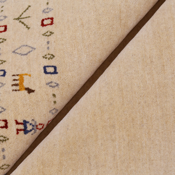 Tribal Border Ivory Design Hand Loomed Wool Area Rug