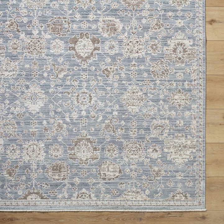 Urara Traditional Style Blue And Cream Area Rug