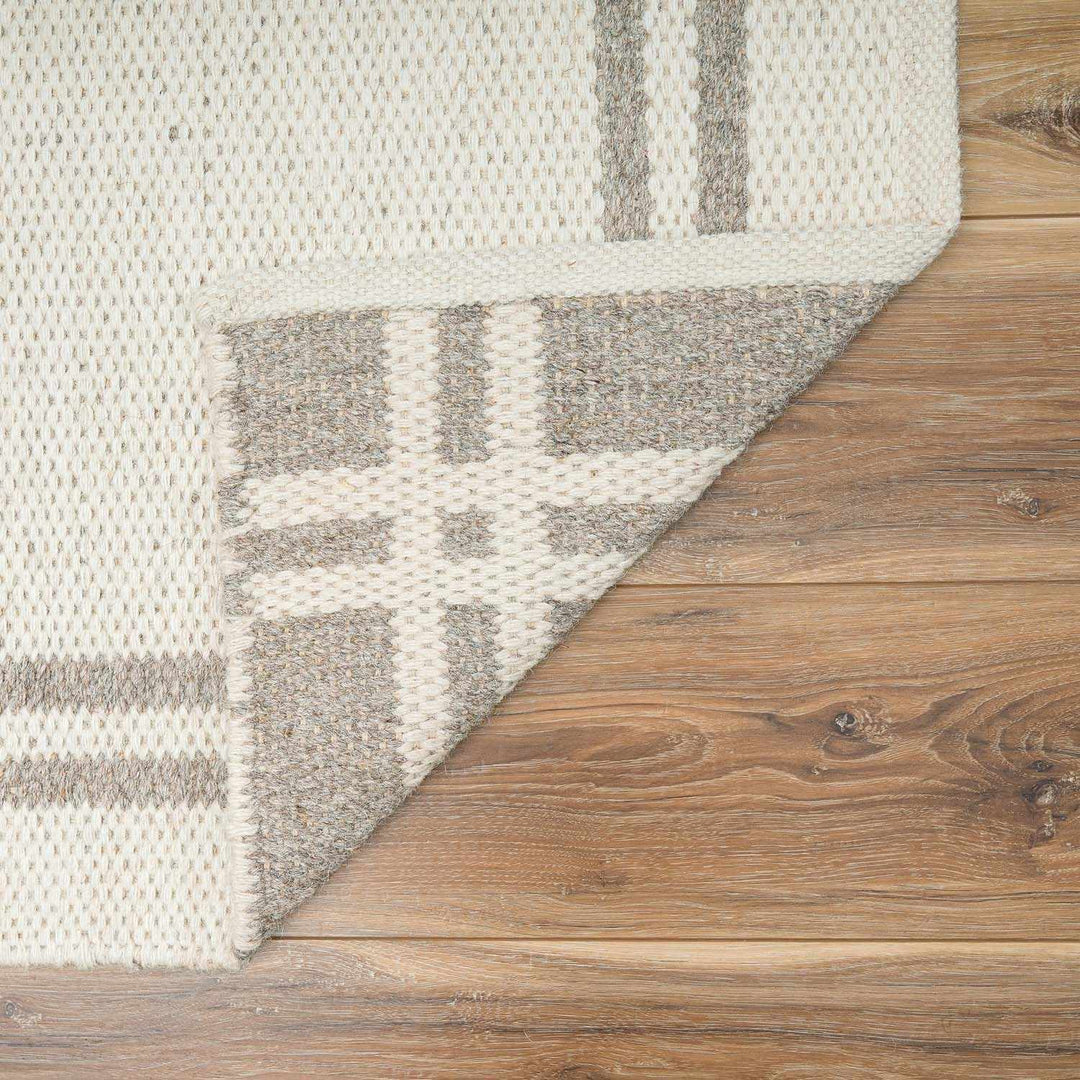 Nimue Ivory Modern Style Hand Woven Wool Area Rug