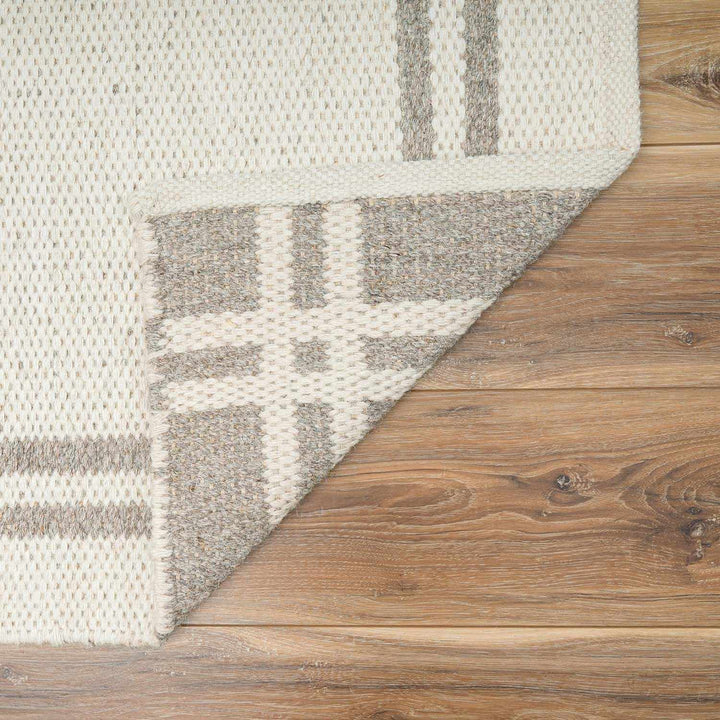 Nimue Ivory Modern Style Hand Woven Wool Area Rug