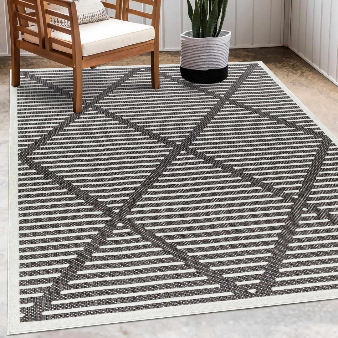 Anah Geometrical Black And Ivory Outdoor Rug