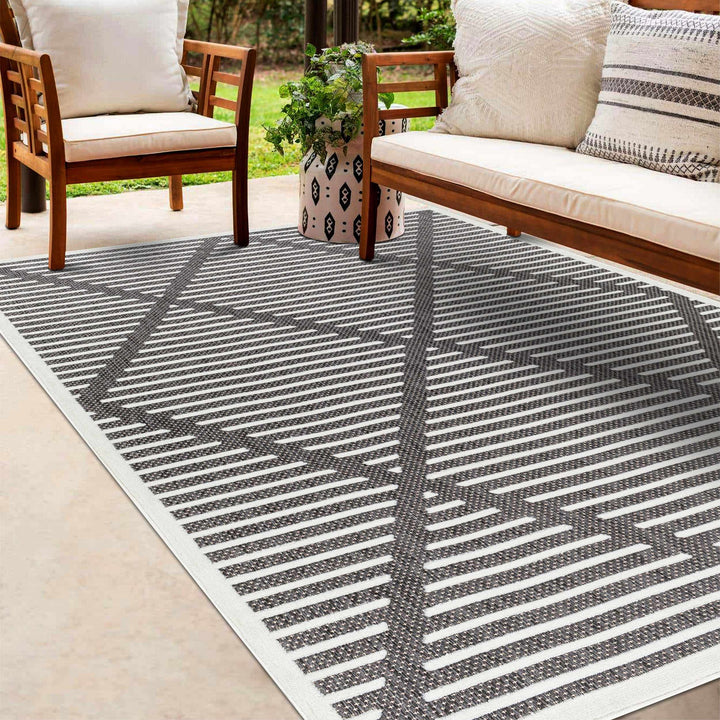 Anah Geometrical Black And Ivory Outdoor Rug