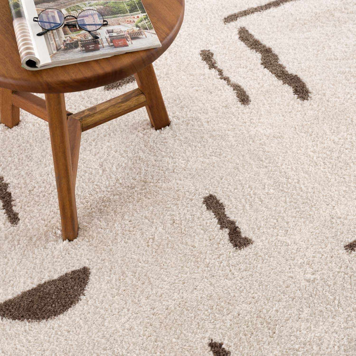 Azriel Contemporary Abstract Ivory And Brown Washable Area Rug