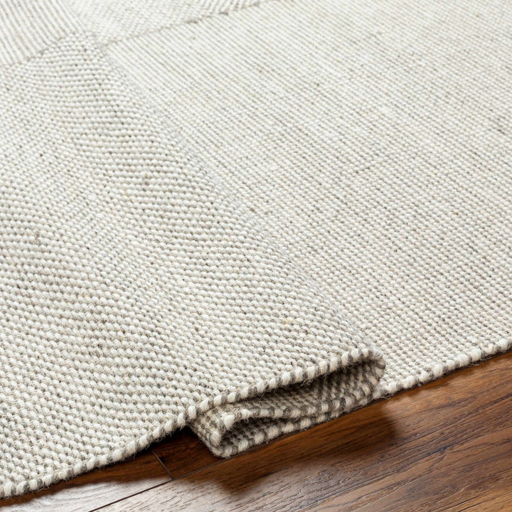 Abhay Bohemian Style Beige Hand Woven Wool Area Rug - The Rug Decor