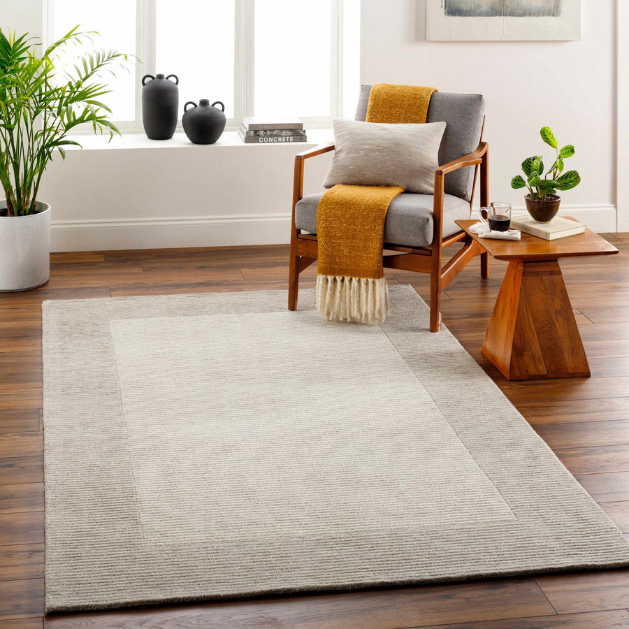 Amadi Contemporary Solid Beige And Brown Wool Area Rug - The Rug Decor