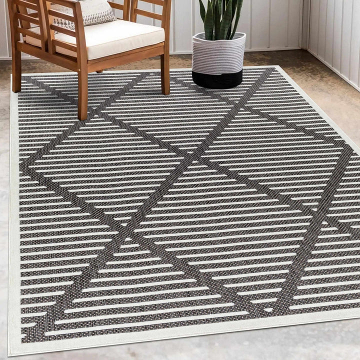 Anah Geometrical Black And Ivory Outdoor Rug - The Rug Decor
