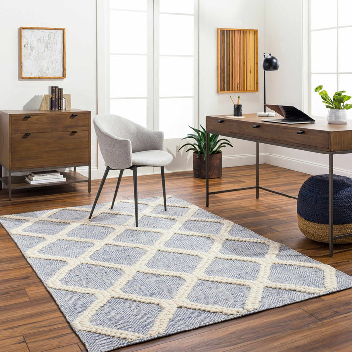 Andra Geometrical Blue And Ivory Hand Woven Wool Rug - The Rug Decor