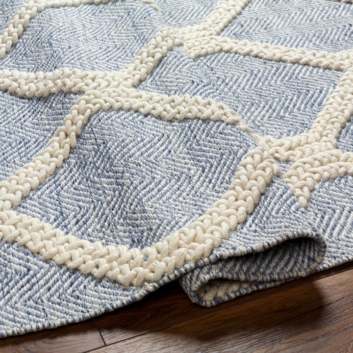 Andra Geometrical Blue And Ivory Hand Woven Wool Rug - The Rug Decor