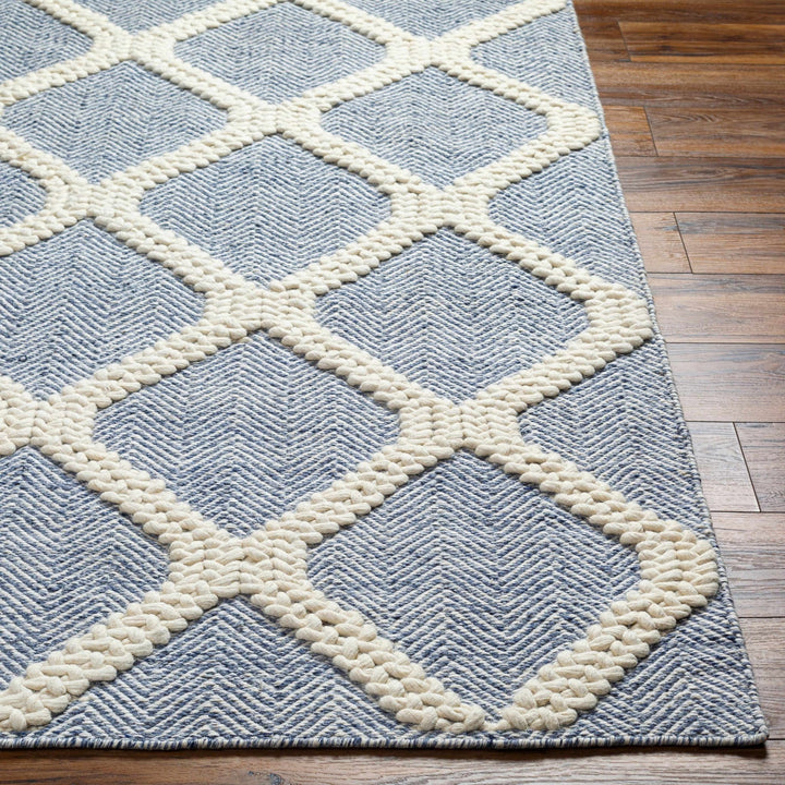 Andra Geometrical Blue And Ivory Hand Woven Wool Rug - The Rug Decor
