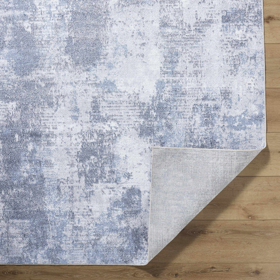 Anitra Modern Abstract Blue Washable Area Rug - The Rug Decor