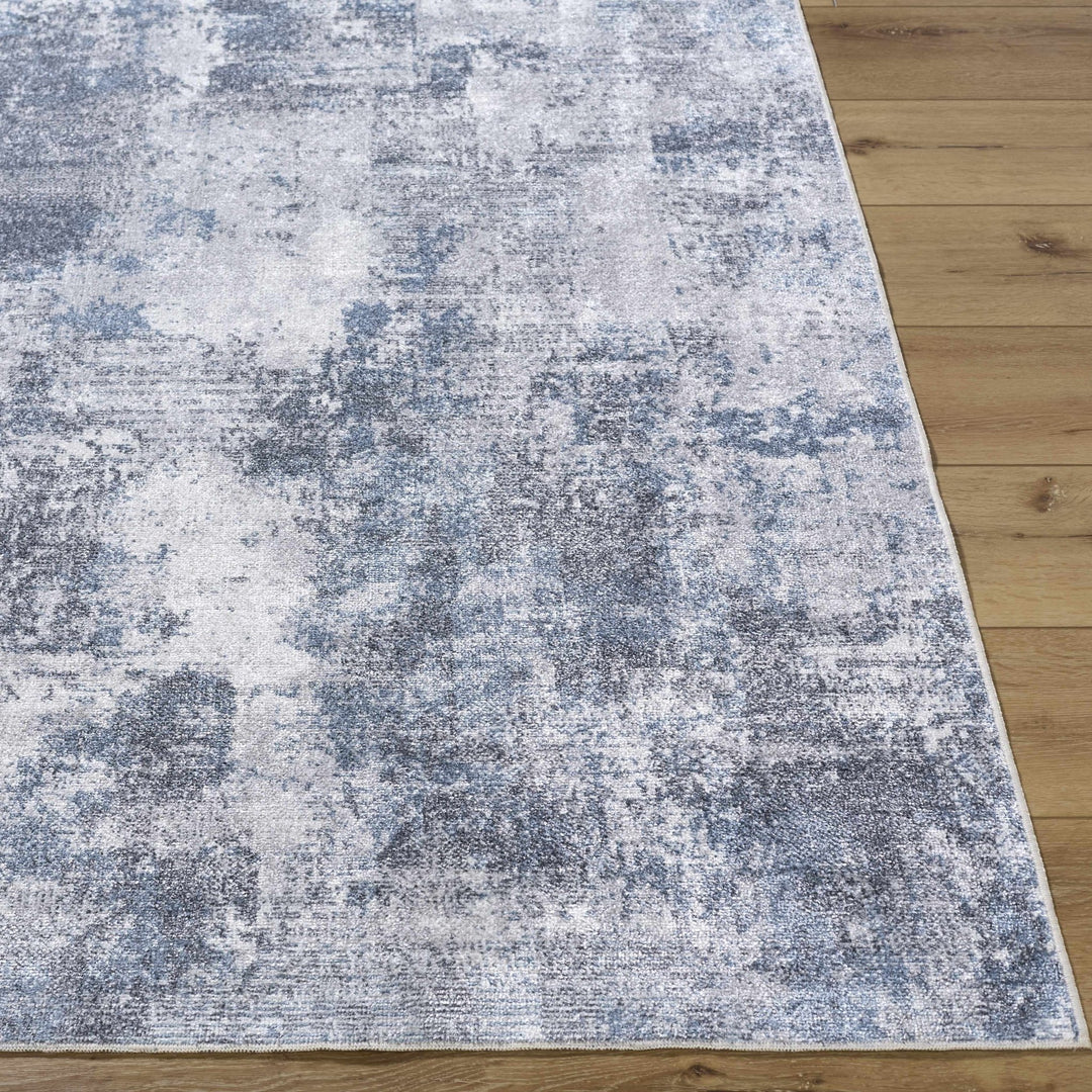 Anitra Modern Abstract Blue Washable Area Rug - The Rug Decor