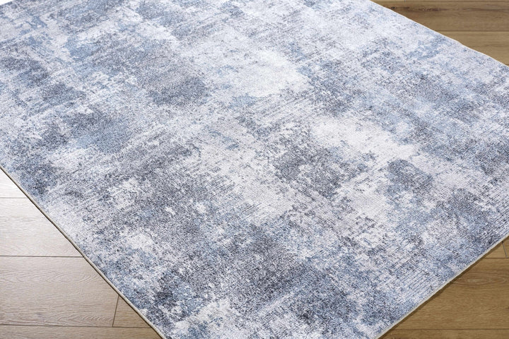 Anitra Modern Abstract Blue Washable Area Rug - The Rug Decor