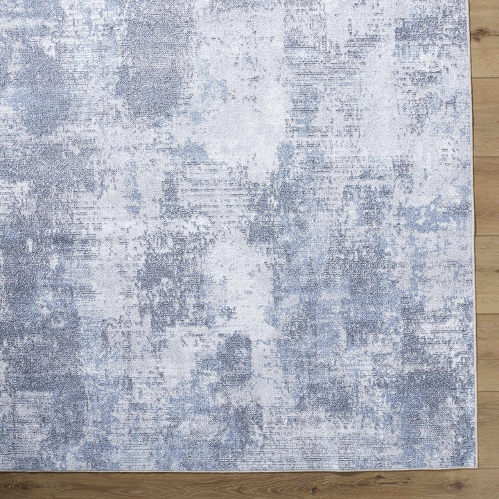 Anitra Modern Abstract Blue Washable Area Rug - The Rug Decor