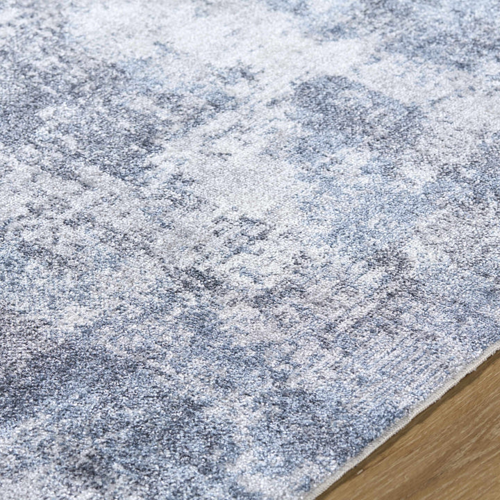 Anitra Modern Abstract Blue Washable Area Rug - The Rug Decor
