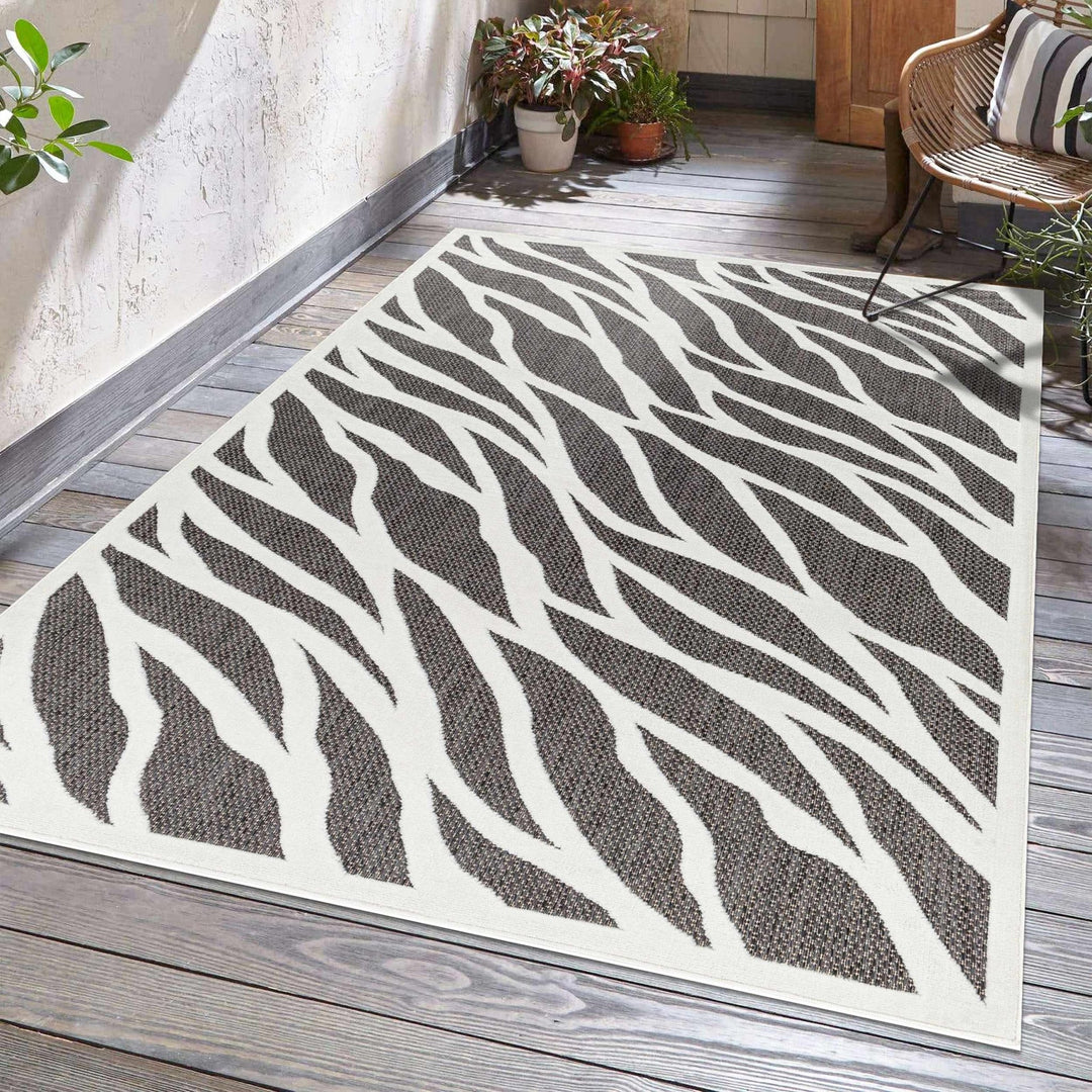 Astra Zebra Print Contemporary Style Black Outdoor Rug - The Rug Decor
