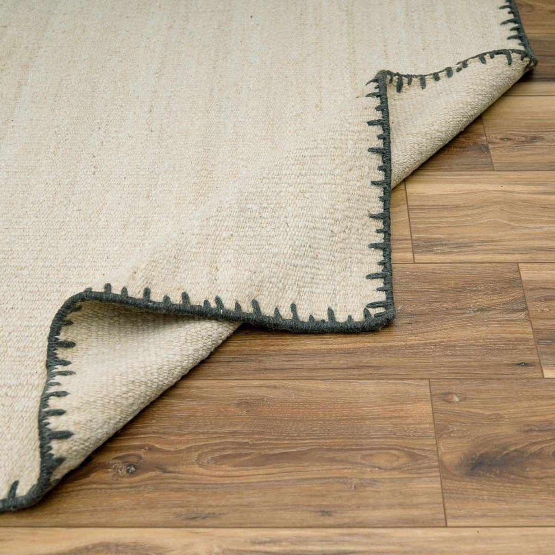 Ayumu Modern Solid Ivory Wool Area Rug - The Rug Decor