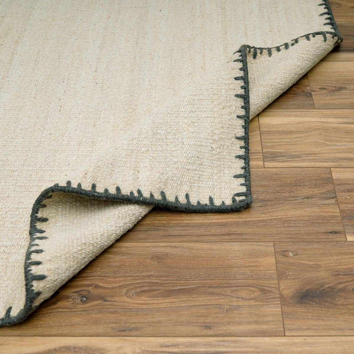 Ayumu Modern Solid Ivory Wool Area Rug - The Rug Decor