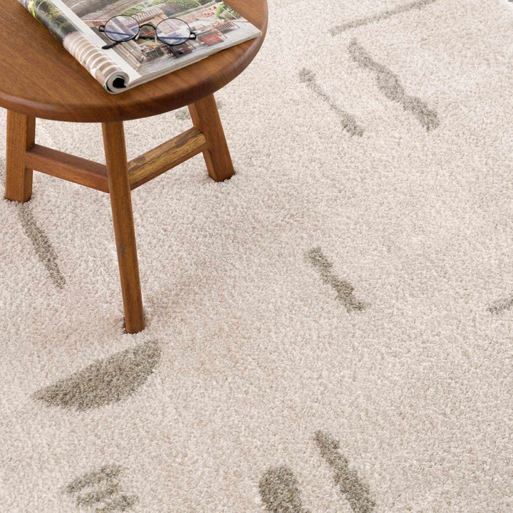 Azriel Contemporary Abstract Design Beige Washable Area Rug - The Rug Decor