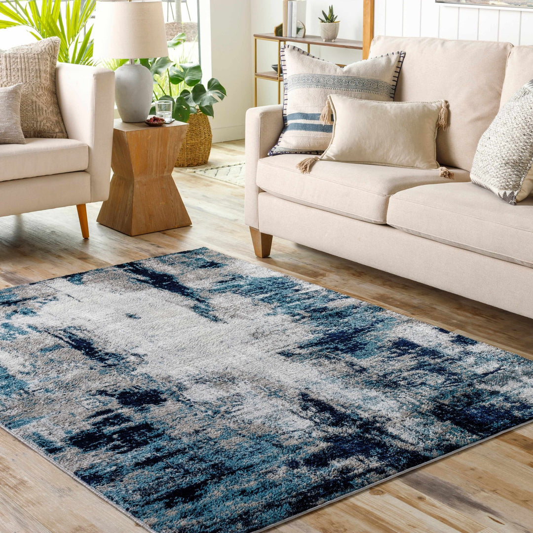 Baldwyn Blue And Ivory Modern Abstract Design Area Rug - The Rug Decor