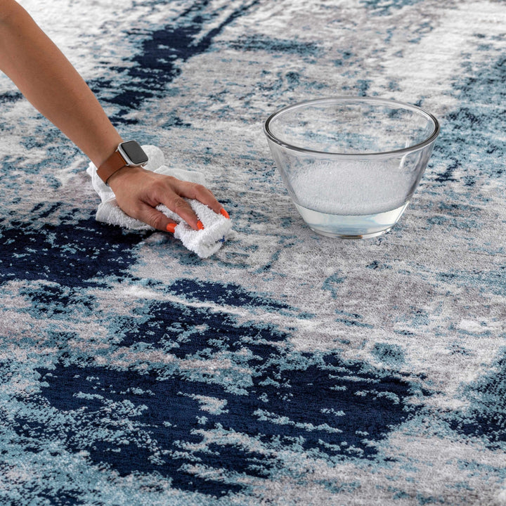 Baldwyn Blue And Ivory Modern Abstract Design Area Rug - The Rug Decor