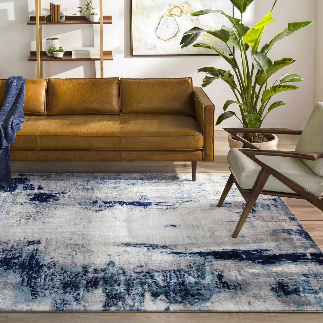 Baldwyn Blue And Ivory Modern Abstract Design Area Rug - The Rug Decor