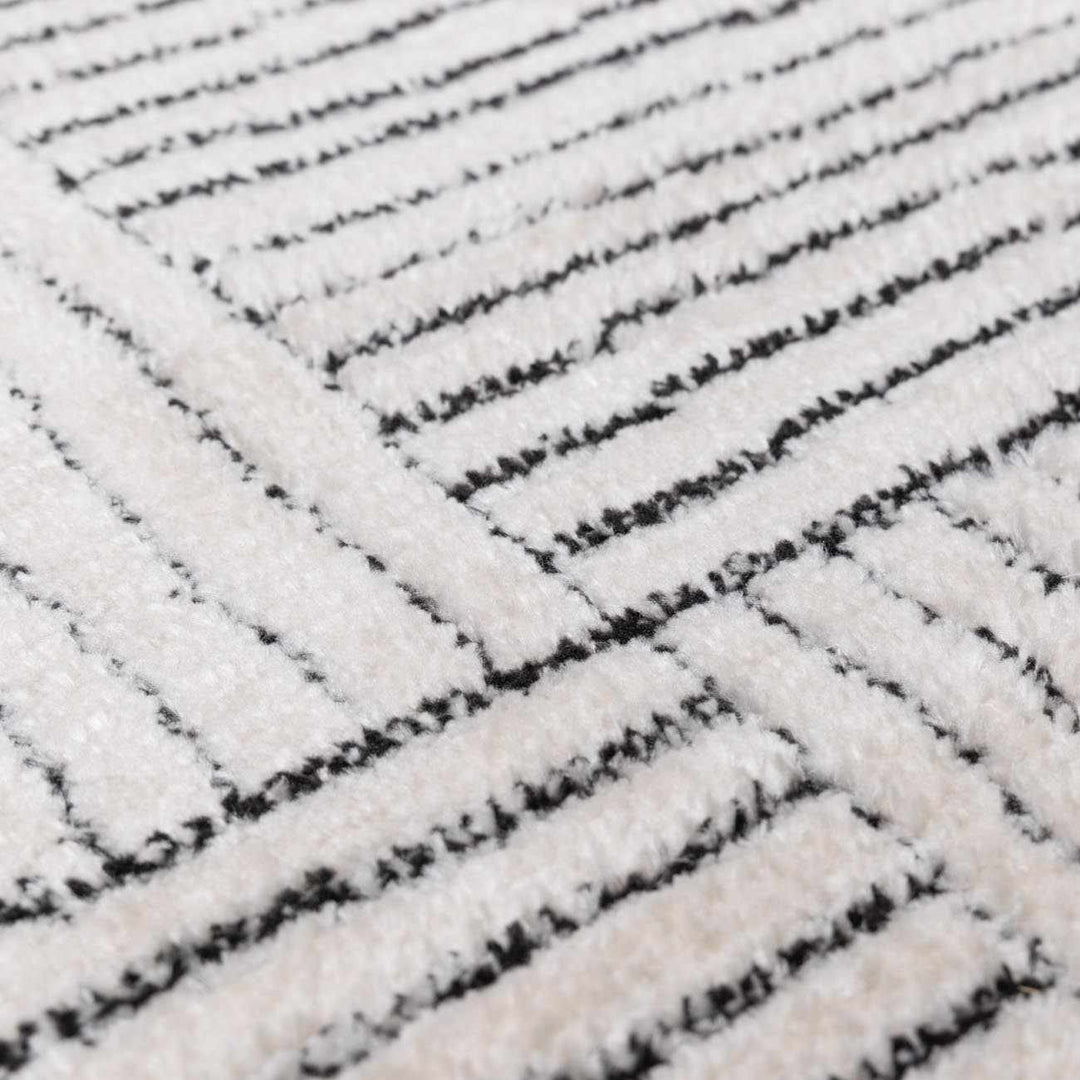 Basira Geometrical Ivory And Black Machine Woven Rug - The Rug Decor