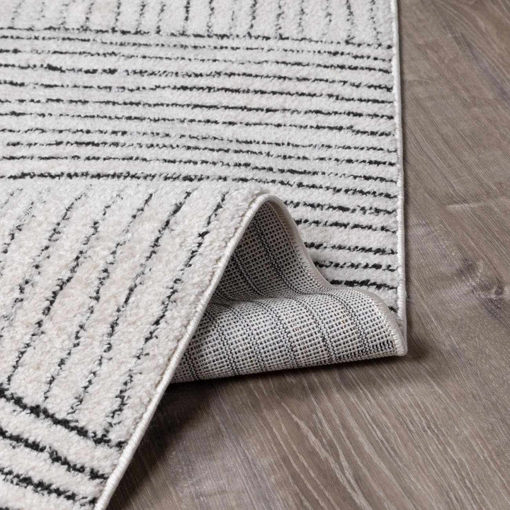 Basira Geometrical Ivory And Black Machine Woven Rug - The Rug Decor