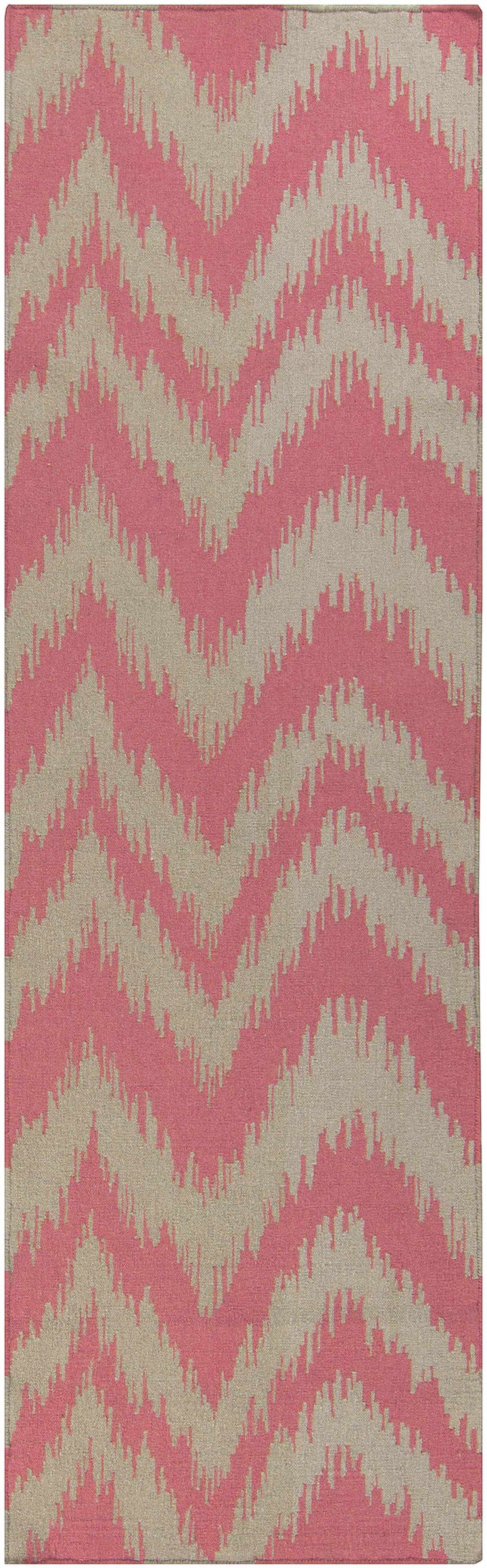 Pink and cream chevron hand-woven area rug with zigzag geometric pattern, vertical crop