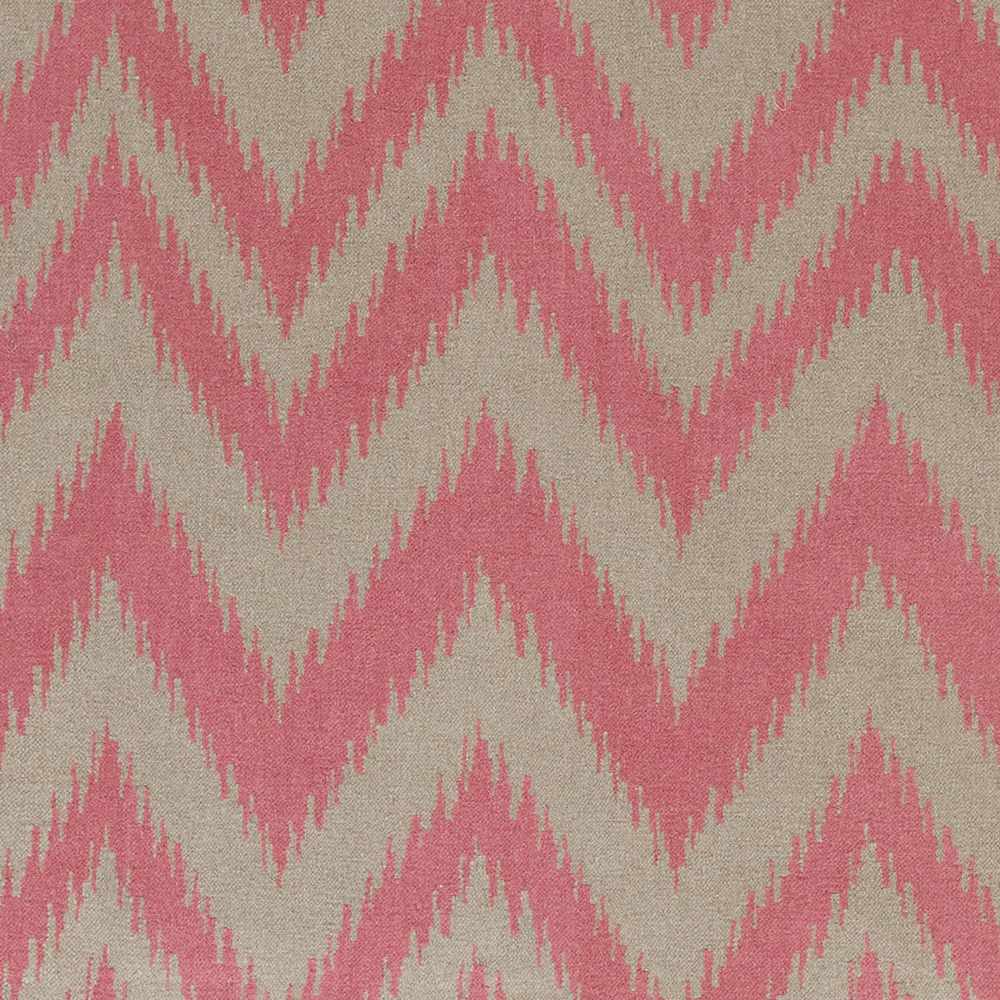 Close-up of pink and cream chevron hand-woven area rug with zigzag pattern