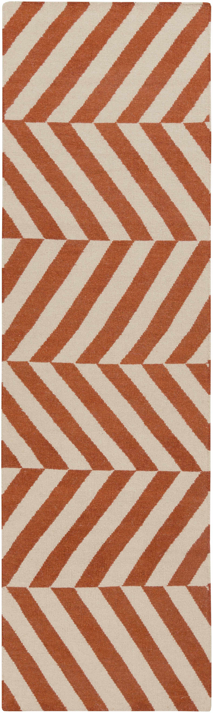 Orange and cream chevron area rug with repeating geometric blocks