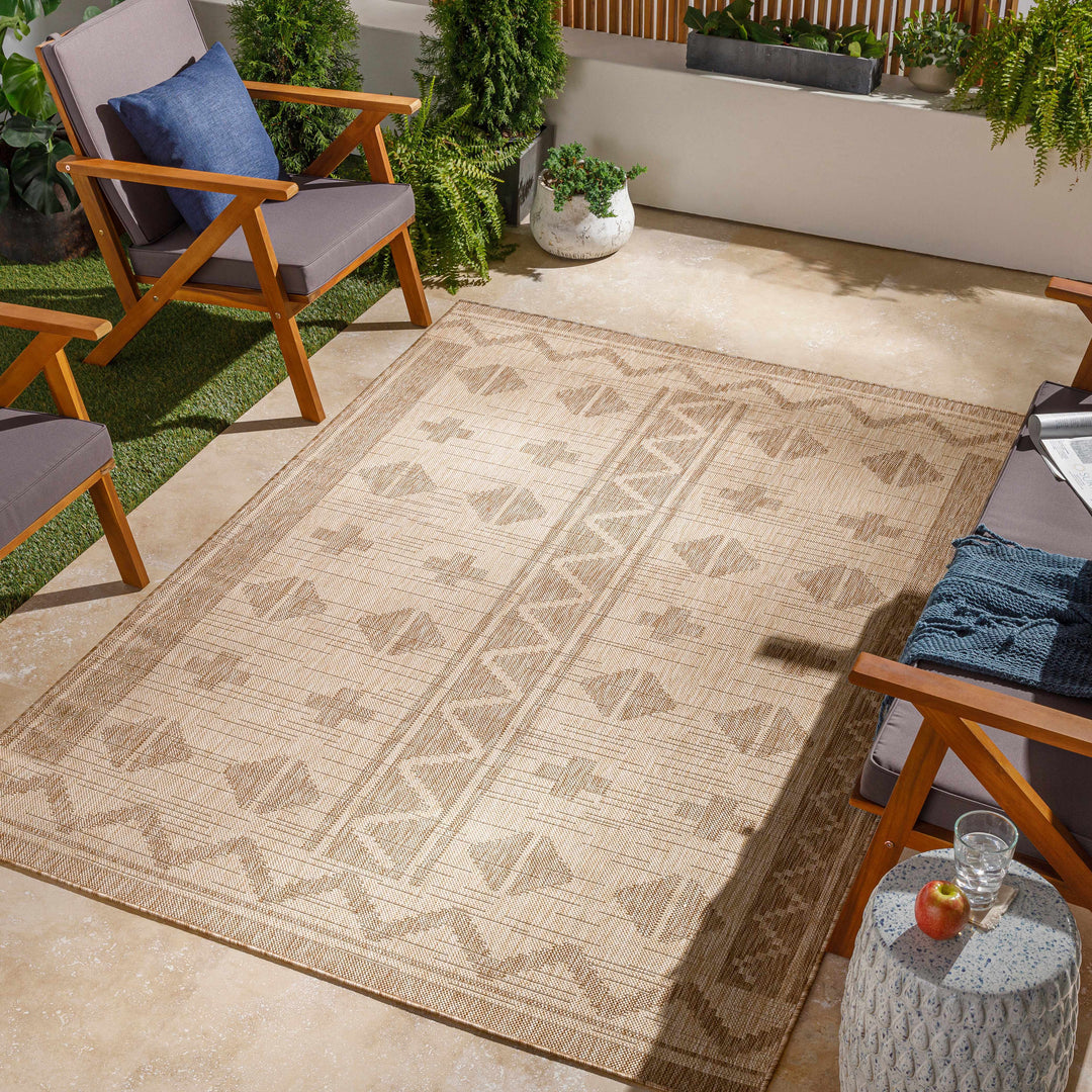 Beige modern area rug with all-over geometric motif in taupe and cream