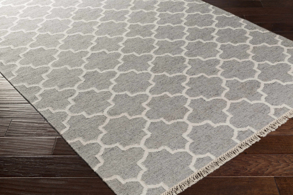 Gray and ivory geometric trellis area rug with interlocking quatrefoil shapes