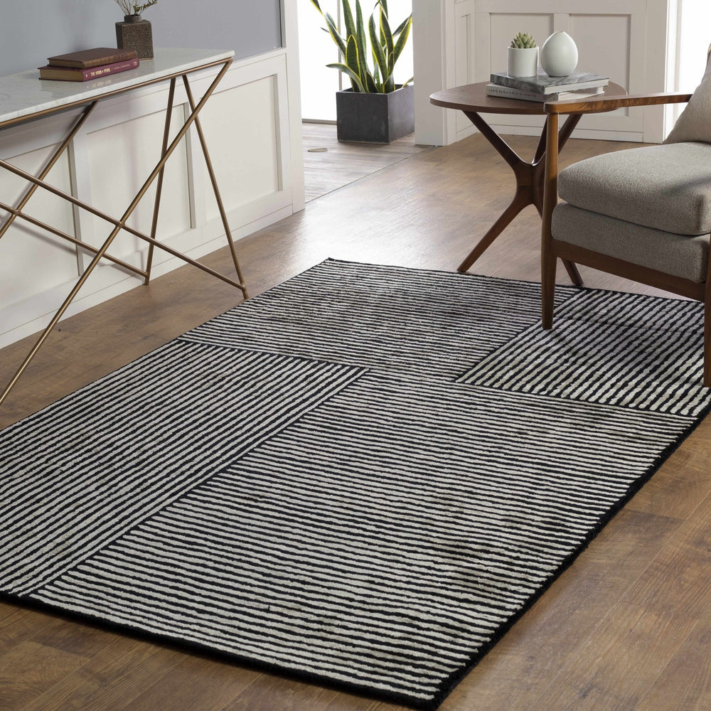 Chittering Modern Style Black And Ivory Hand Tufted Area Rug - The Rug Decor